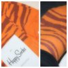 Glade tigerstribede strømper fra Happy Socks. Fås også i andre farvekombinationer. Se mere om Happy Socks på Happysocks.com. - Dyreprint-detaljer